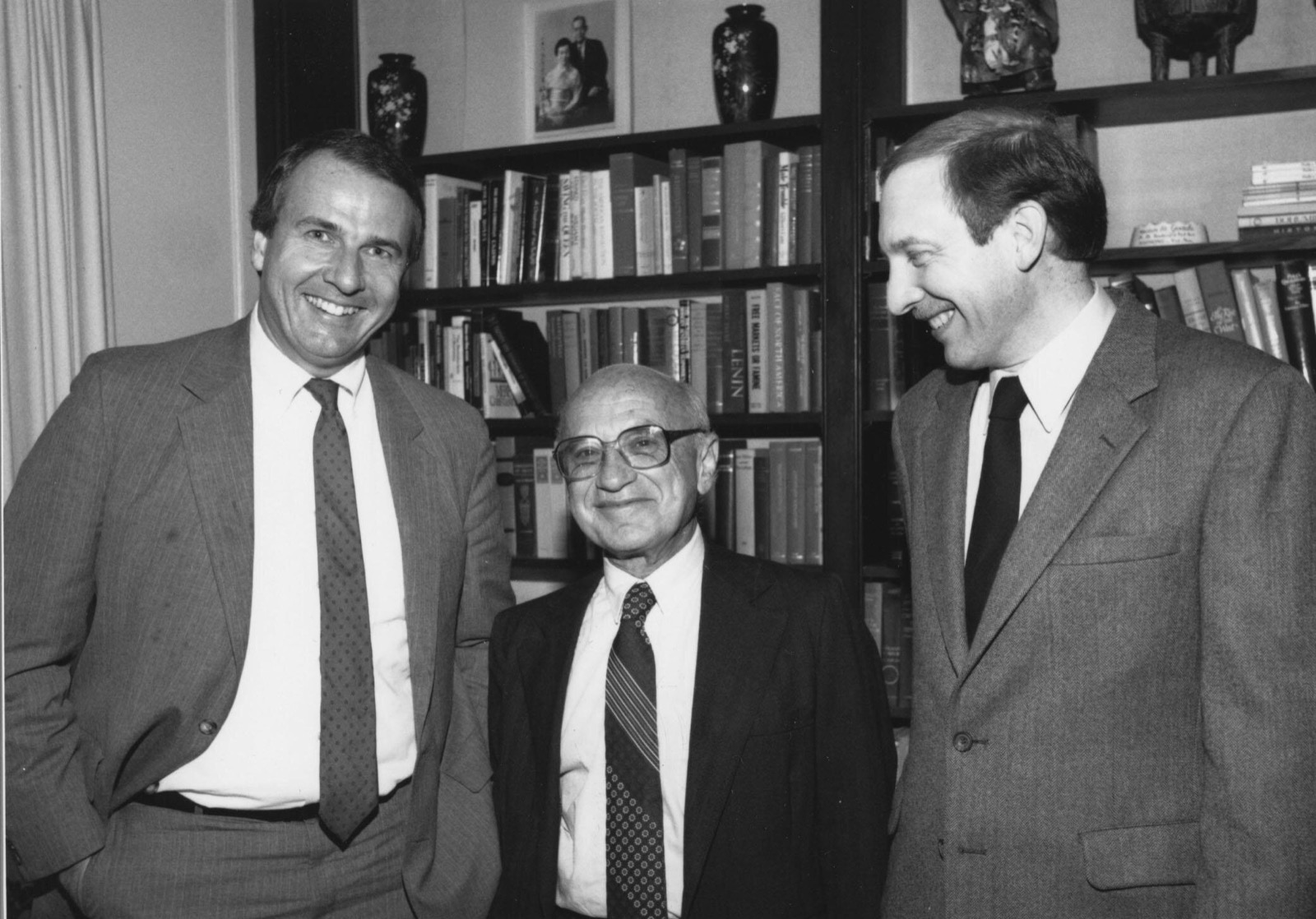 Edward H. Crane III with Milton Friedman and others